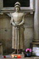 Statue of St Joan of Arc with fleur-de-lis on her garments who visited Amiens in 1430. Amiens, France.