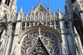 Flamboyant Gothic rose window exterior details of St-Ouen Abbey Church. Rouen, France.