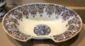 Rouen-made earthenware barber bowl at Rouen Ceramic Museum. Rouen, France.