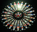 South rose window by André Robin representing God in Majesty, the Zodiac & the Elders of the Apocalypse at St Maurice of Angers Cathedral. Angers, France.