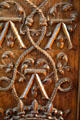 Detail of fine carving of royal emblems on wooden chest in Drummers' Room of Royal Lodge at Chateau Royal of Amboise. Amboise, France.