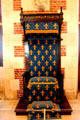 Throne decorated with fleur de lys in Council Chamber in Royal Lodge at Chateau Royal of Amboise. Amboise, France.