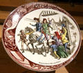Joan of Arc departs for Chinon on porcelain plate By Sarreguemines Factory in Royal Lodgings museum at Château de Chinon. Chinon, France.
