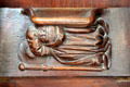Carved praying pilgrim detail on choir stall in Chapel at Chateau D'Ussé. Ussé, France.