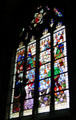 Joan arrives in Orleans panel from life of Joan of Arc stained glass windows by J. Galland & E. Gibelin at Orleans Cathedral. France.