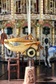 Figure of early plane on carousel in Jardin Albert 1er, Promenade du Paillon. Nice, France.