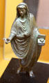 Bronze statuette of Roman priest offering incense at Gallo Roman Museum. Lyon, France.