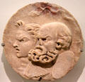 Roman marble with masks of Silenus & Satyr at Musée de la Romanité. Nimes, France