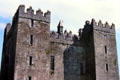 Bunratty Castle with four stone towers. Ireland