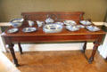 Dining room side table with blue porcelain serving dishes at Emo Court. Ireland.