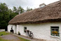 Foley's, a medium sized farm with a thatched roof & a three room dwelling at Muckross Traditional Farms in Killarney National Park. Killarney, Ireland.
