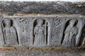Carved saints between Celtic knots at Jerpoint Abbey. Ireland.