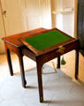 Writing desk which slides out from small table at Bishop's Palace. Waterford, Ireland