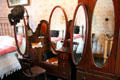 Vanity table with large mirrors in Golden Vale Farmhouse at Bunratty Castle & Folk Park. County Clare, Ireland.