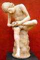 Roman-era sculpture of Boy with Thorn at Uffizi Gallery. Florence, Italy