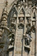 Saints with gargoyles on Duomo. Milan, Italy.
