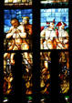 Devils in stained-glass of Duomo. Milan, Italy.