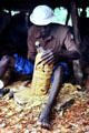Carver working away on a wooden sculpture in Malindi market. Kenya