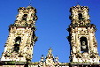 Lavishly decorated towers of church of Santa Prisca in Taxco. Mexico.
