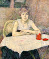 Young woman at table "Poudre de riz" painting by Henri de Toulouse-Lautrec at Van Gogh Museum. Amsterdam, NL.