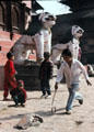 Children playing hoops in Katmandu. Nepal