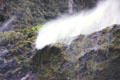 Strong updrafts keep waterfall from falling in Milford Sound. New Zealand.