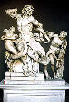 Death of Laocoon in Vatican Museum features priest of Apollo crushed to death along with sons by snakes part of Lacuane Group by artists from Rhodes. Vatican City.