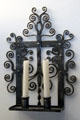 Wall-mounted wrought iron candle holder at Gladstone's Land tenement house. Edinburgh, Scotland.