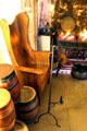 Armchair & adjustable candle stick in kitchen at Gladstone's Land tenement house. Edinburgh, Scotland.