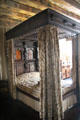 Four poster canopy bed in painted chamber at Gladstone's Land tenement house. Edinburgh, Scotland.
