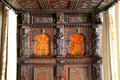 Carved headboard on canopy bed in painted chamber at Gladstone's Land tenement house. Edinburgh, Scotland.