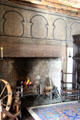 Fireplace with painted arches in painted chamber at Gladstone's Land tenement house. Edinburgh, Scotland.