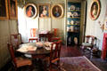 Georgian room with portraits of Graham family at Gladstone's Land tenement house. Edinburgh, Scotland.