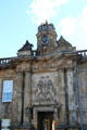 Formal entrance to Holyrood Palace with Royal Arms of Scotland. Edinburgh, Scotland.