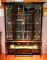 Display cabinet by Ernest Archibald Taylor made by Wylie & Lochhead of Glasgow at Kelvingrove Art Gallery. Glasgow, Scotland.