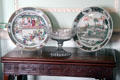 Chinese-import plates & glass pedestal bowl in drawing room at Pollok House. Glasgow, Scotland.