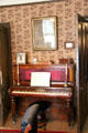 Parlor piano by Laubach & Sons of Edinburgh at Tenement House museum. Glasgow, Scotland.