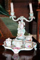 Ornate porcelain tea service, tray & candelabra in White Satin Bedchamber at Hopetoun House. Queensferry, Scotland.