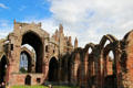 Arches in ruins of nave with screen which closed off monk's choir at Melrose Abbey. Melrose, Scotland.