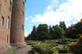 Rose garden beside tower at Glamis Castle. Angus, Scotland.