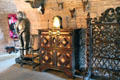 Armor, chest-on-chest & Victor fire screen in crypt at Glamis Castle. Angus, Scotland.