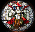 Stained glass window of St George slaying dragon in chapel at Glamis Castle. Angus, Scotland.