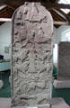 Pictish cross-slab with strips showing mounted huntsmen, warriors, Vanora execution scene , centaur & beast biting ox at Meigle Sculptured Stone Museum. Meigle, Scotland
