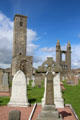 Celtic cross before ruins at St Andrews Cathedral. St Andrews, Scotland.