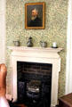 Fireplace with portrait of Thomas W. Lorimer by John Henry Lorimer in Professor's room at Kellie Castle. Pittenweem, Scotland.