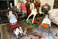 Rocking horse, riding toys & doll carriages in nursery at Kellie Castle. Pittenweem, Scotland.