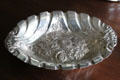 Embossed silver sweets dish at Hill of Tarvit Mansion. Cupar, Scotland.