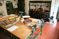 Kitchen work table with meat grinders & cooking tools at Hill of Tarvit Mansion. Cupar, Scotland.