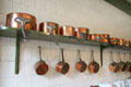 Copper pans in kitchen at Hill of Tarvit Mansion. Cupar, Scotland.