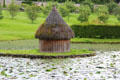 Traditional Scottish hut on garden lake at Blair Castle. Pitlochry, Scotland
